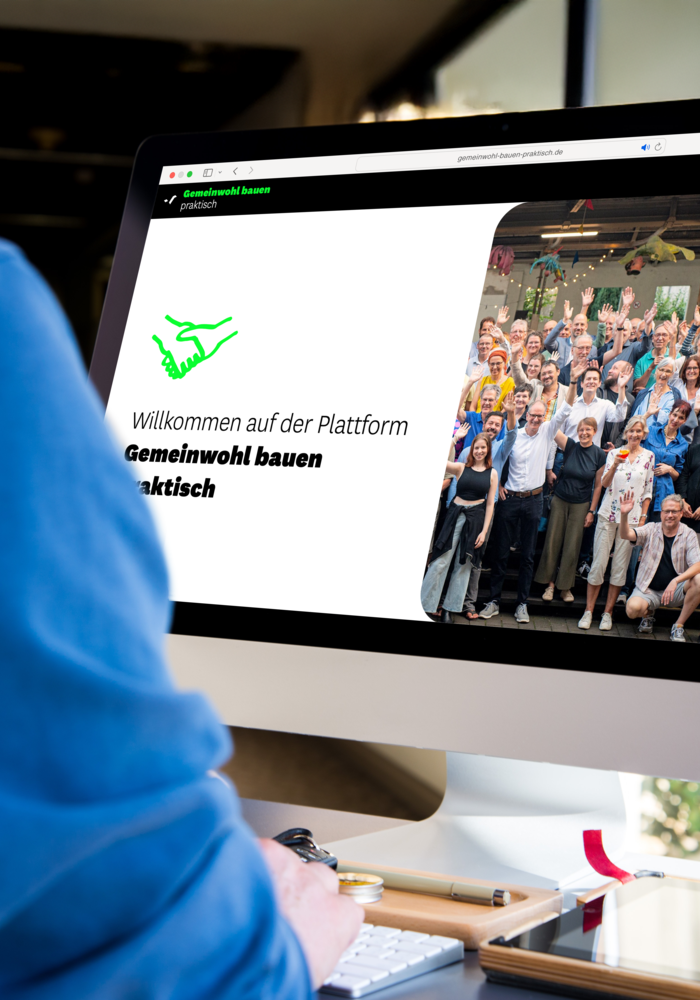 auf einem Bildschirm ist die Website Gemeinwohl bauen praktisch zu sehen